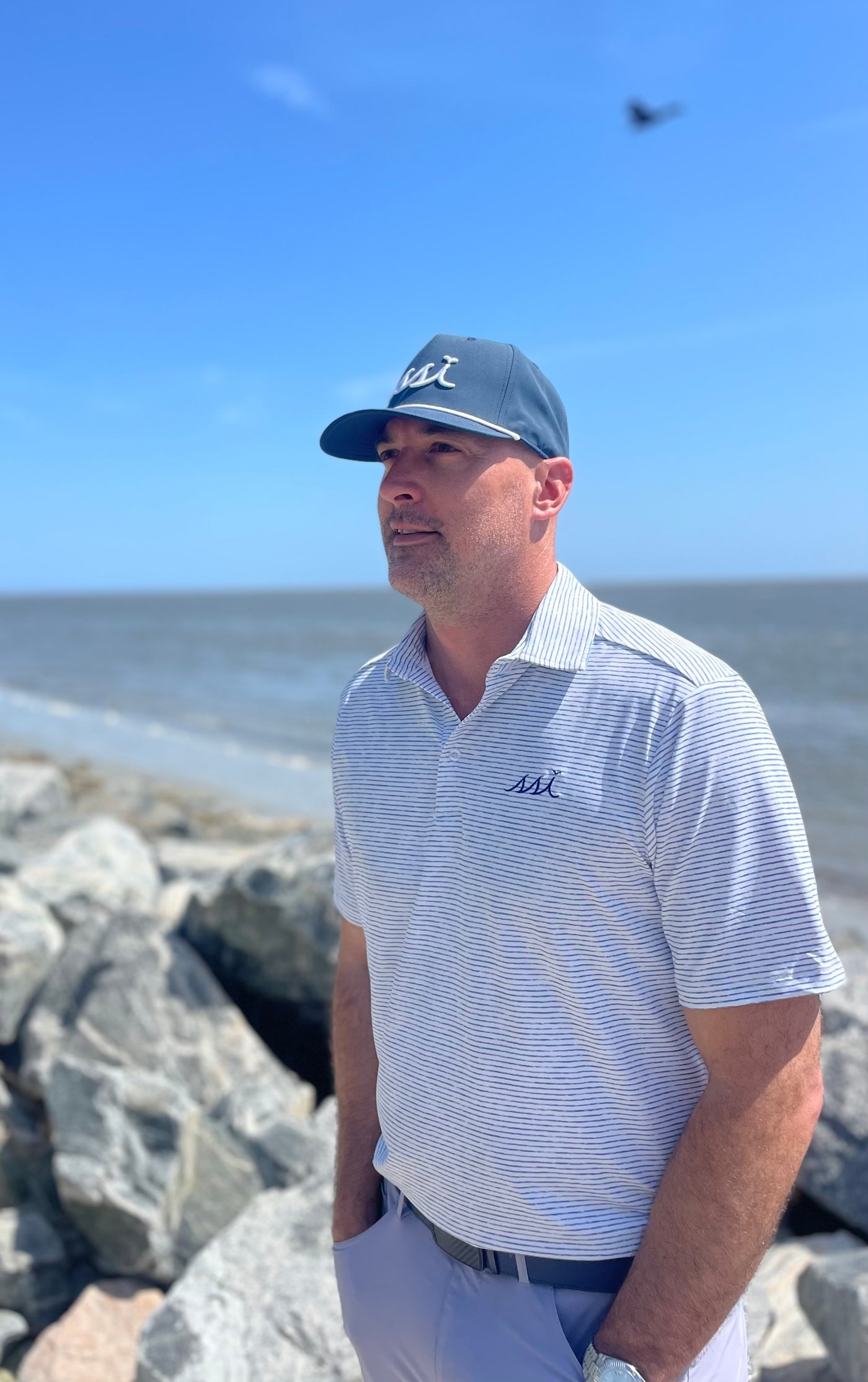 Men's White and Navy St. Simons Island Striped Performance Polo Shirt — Navy SSI Logo