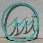 24” round metal logo sign in aqua