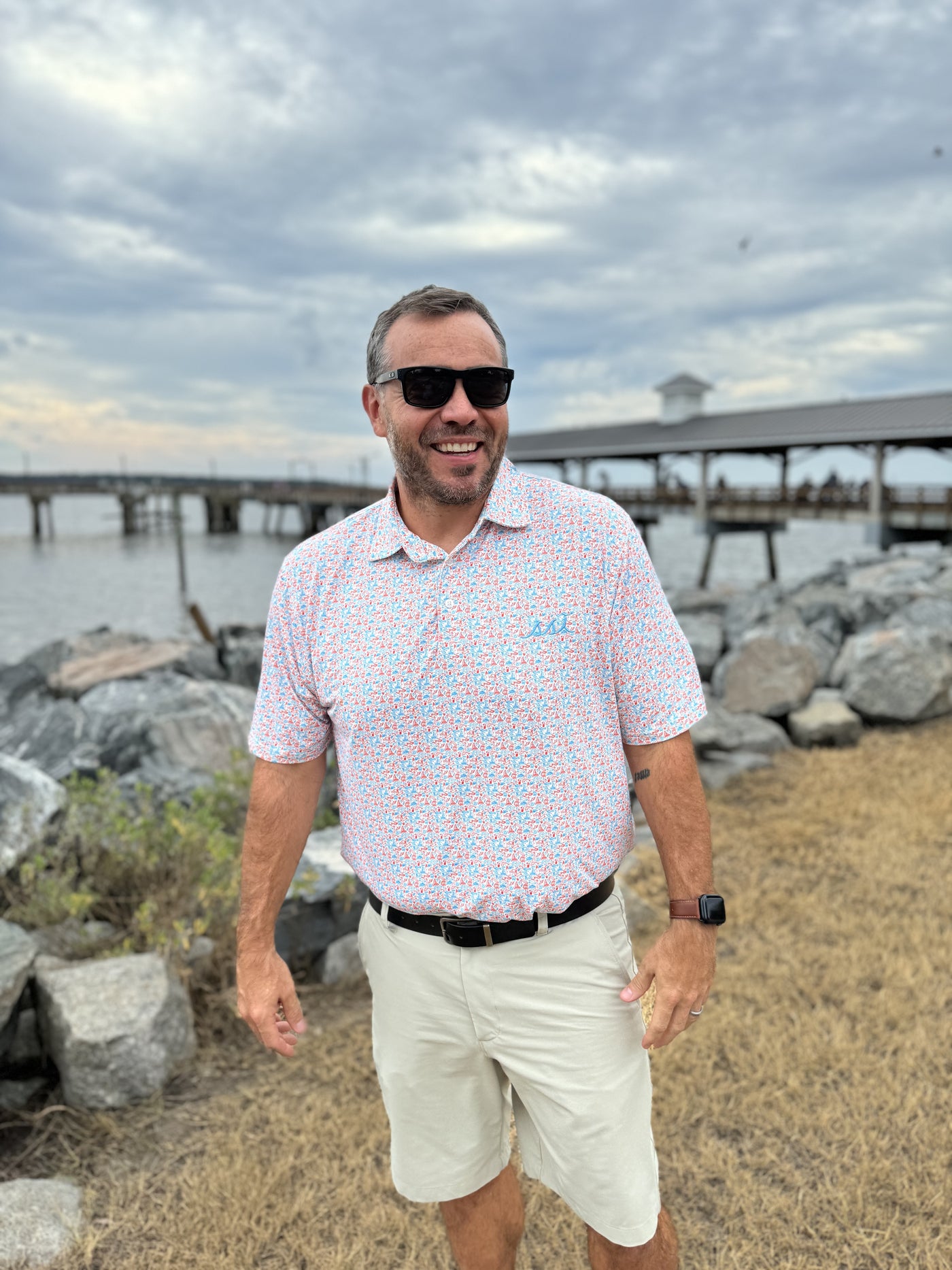 Men's Red and Blue St. Simons Island Icons Allover Print Performance Polo Shirt — Blue SSI Logo