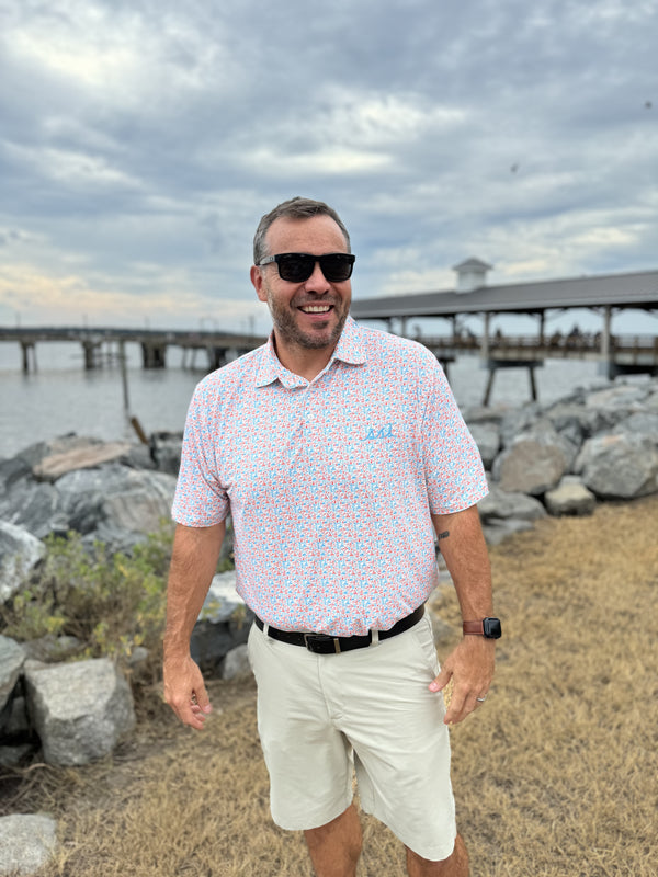 Men's Red and Blue St. Simons Island Icons Allover Print Performance Polo Shirt — Blue SSI Logo