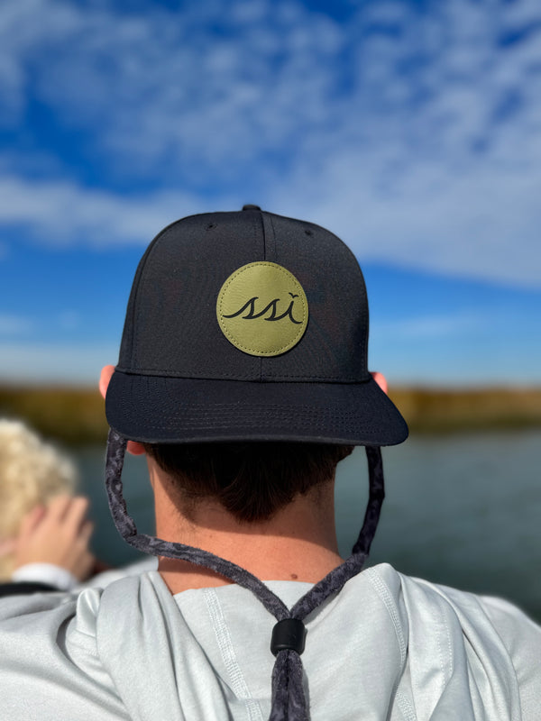 Black Performance Cap — Round Olive Leather Patch
