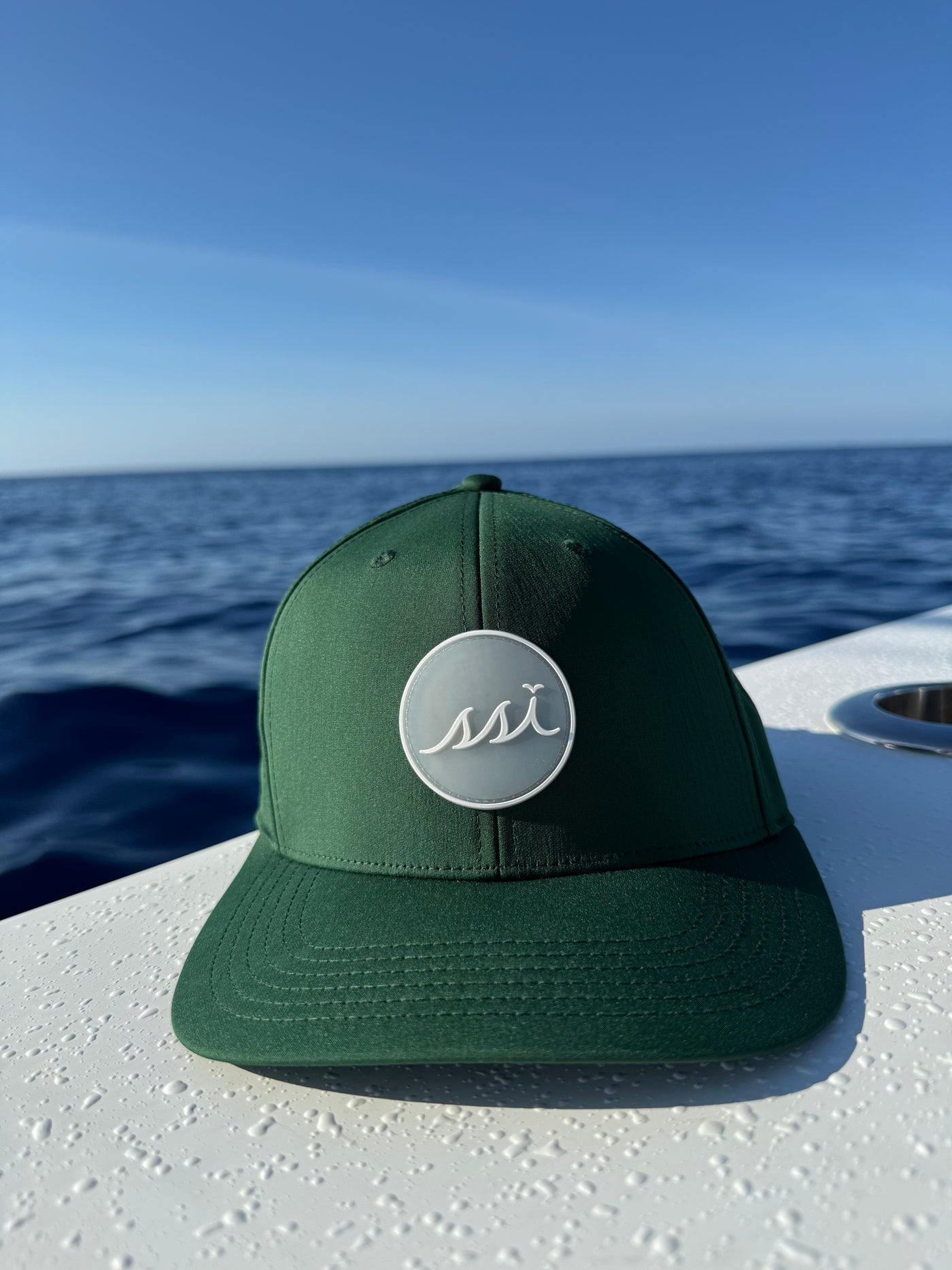 Forest Green Performance Cap — Round PVC Patch with White Logo