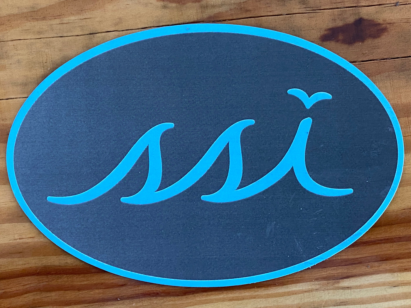 Grey and Light blue oval magnet