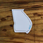 White grey and light blue state outline magnet
