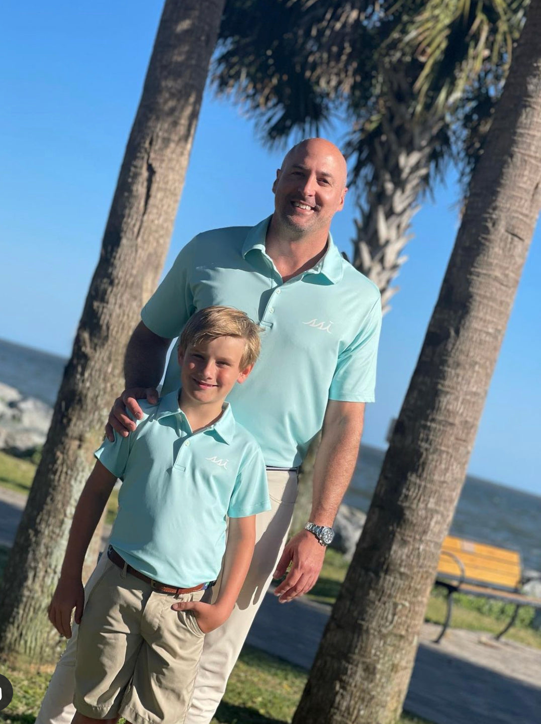 Stretch Performance Men's Polo Light Aqua with White Logo